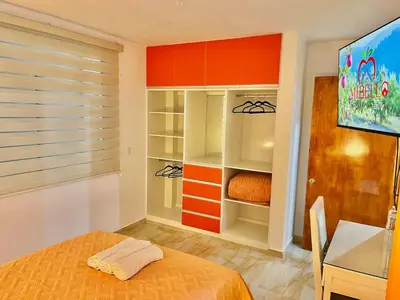 Cama o camas de una habitación en Mi bello Zacatlán-Suite Manzana Delicia