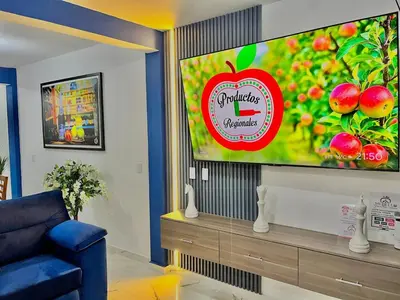 Una televisión o centro de entretenimiento en Mi bello Zacatlán-Suite Manzana Peruana