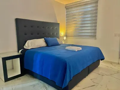 Cama o camas de una habitación en Mi bello Zacatlán-Suite Manzana Peruana