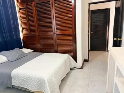 Cama o camas de una habitación en Departamento completo bien ubicado