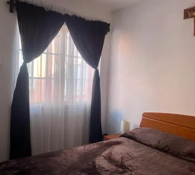 Cama o camas de una habitación en Gran casa de descanso