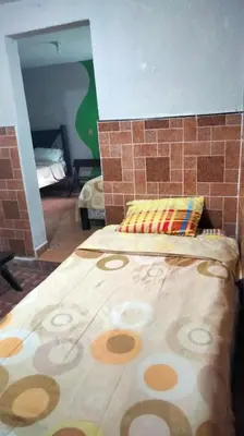 Cama o camas de una habitación en Casa del Patrón Posada