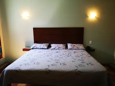 Cama o camas de una habitación en Hotel Rivera