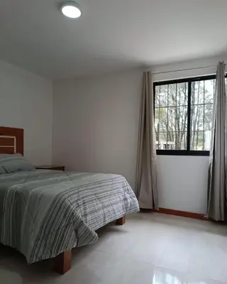 Cama o camas de una habitación en Cabañas El Rincón de los Sueños