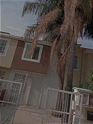 Edificio en el que se encuentra la habitación en casa particular