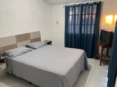 Cama o camas de una habitación en Casa en Acapulco diamante