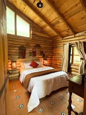 Cama o camas de una habitación en Cabaña Flor de Agave