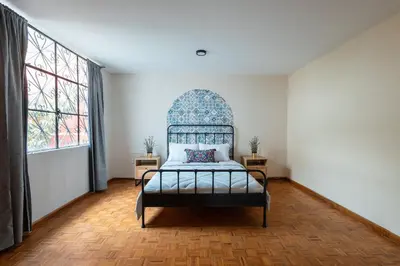 Cama o camas de una habitación en Hermosa Casa en Centro Histórico | 5 hab + Est