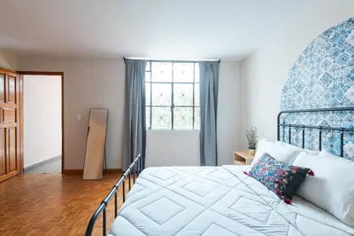 Cama o camas de una habitación en Hermosa Casa en Centro Histórico | 5 hab + Est