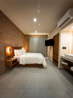 Cama o camas de una habitación en Kooch Aparthotel