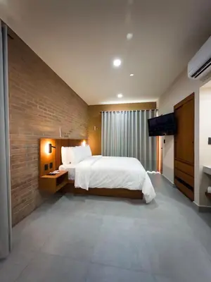 Cama o camas de una habitación en Kooch Aparthotel