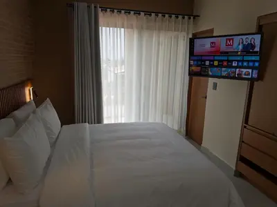 Cama o camas de una habitación en Kooch Aparthotel