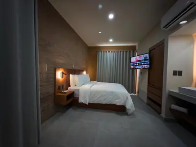 Cama o camas de una habitación en Kooch Aparthotel