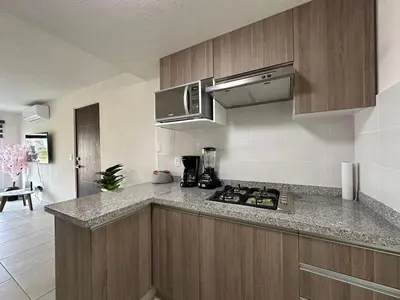 Una cocina o zona de cocina en Depa MAJUM Aries