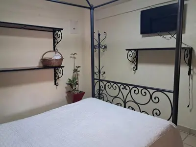 Cama o camas de una habitación en Hotel Antigua Encomienda