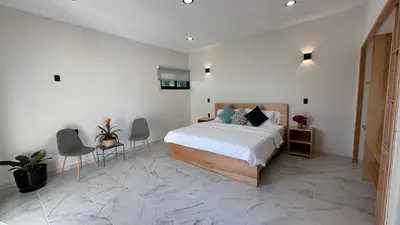 Cama o camas de una habitación en Chalchitepetl hab en Casa Carolina