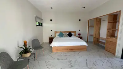 Cama o camas de una habitación en Chalchitepetl hab en Casa Carolina