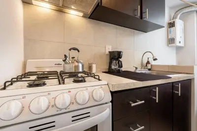 Una cocina o zona de cocina en Depto moderno cerca Estadio GNP y Aeropuerto