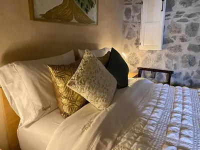 Cama o camas de una habitación en Rafaello Loft in Val'Quirico