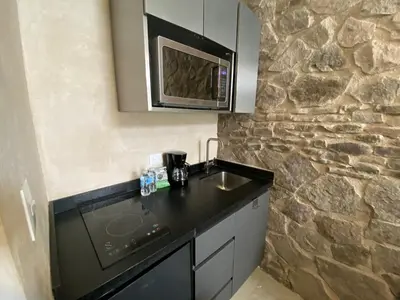 Una cocina o zona de cocina en Rafaello Loft in Val'Quirico