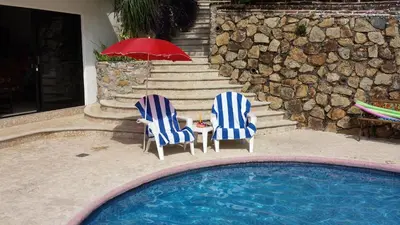 Piscina en o cerca de Villa Costa Chica Comodisimo piscina gigante jardines