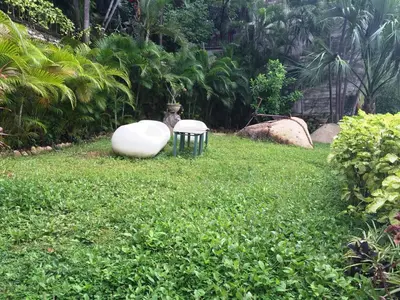 Jardín al aire libre en Villa Costa Chica Comodisimo piscina gigante jardines