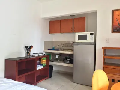 Una cocina o zona de cocina en Villa Costa Chica Comodisimo piscina gigante jardines