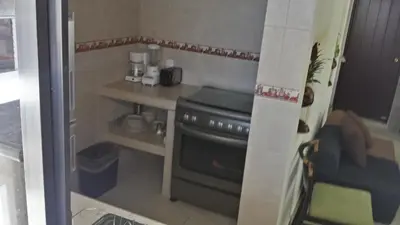 Una cocina o zona de cocina en Villa Guitarron gran terraza vista espectacular 6 huespedes piscina gigante