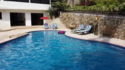 Piscina en o cerca de Villa Guitarron gran terraza vista espectacular 6 huespedes piscina gigante