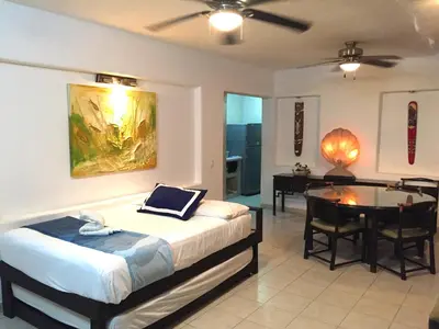 Cama o camas de una habitación en Villa Guitarron gran terraza vista espectacular 6 huespedes piscina gigante