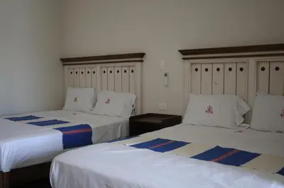 Cama o camas de una habitación en Hotel Finca San José