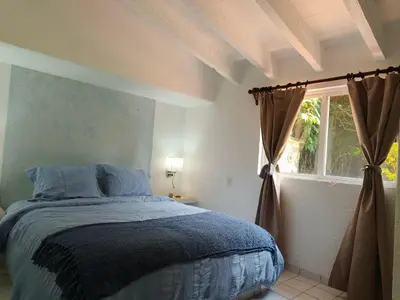 Cama o camas de una habitación en Portal Azahualco Bungalow 1 close to the mountain