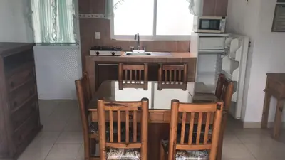 Una cocina o zona de cocina en SUITES HOTEL natural Africam Safari