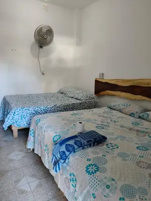 Cama o camas de una habitación en Fiesta Zipolite