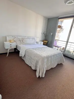 Cama o camas de una habitación en Cómodo departamento