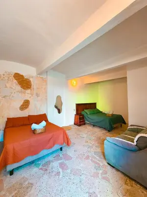 Cama o camas de una habitación en Habitaciones CASA BULE