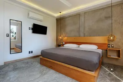 Cama o camas de una habitación en Unmatched Modern PH Loft in the Center of la Punta