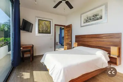 Cama o camas de una habitación en Casa del Angel Tomatal, a beachfront house