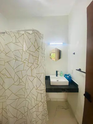 Un baño de JiuteHaus 7