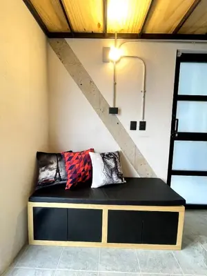 Cama o camas de una habitación en Living Universidad