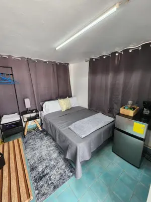 Cama o camas de una habitación en La Casona Xalapa, céntrica y lugar muy tranquilo