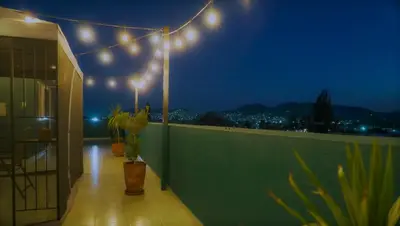 Un balcón o terraza de Habitación nueva y cálida con serenidad en la terraza GARCÍA LÓPEZ