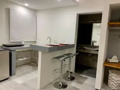Una cocina o zona de cocina en Acogedora suite con entrada independiente
