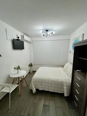 Cama o camas de una habitación en Estudio a 5 minutos de la Playa con Cocineta