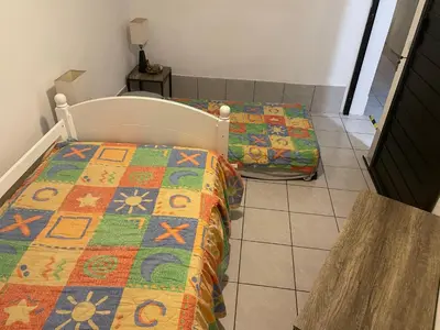 Cama o camas de una habitación en Departamento céntrico puerta calle con 47 amenidades