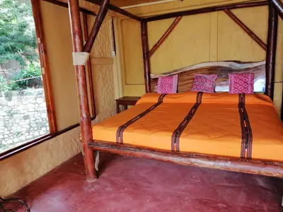 Cama o camas de una habitación en Ecolodge Rancho del Lago