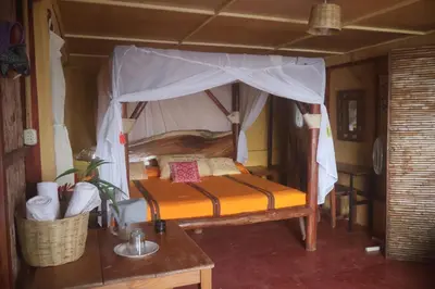 Cama o camas de una habitación en Ecolodge Rancho del Lago