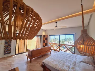 Cama o camas de una habitación en Magnifico Loft para 2 con Vista al Mar de Zicatela