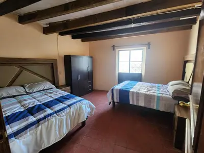 Cama o camas de una habitación en Camino Santa Prisca