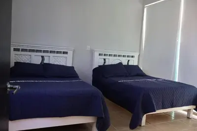 Cama o camas de una habitación en Casa de la Puesta del Sol